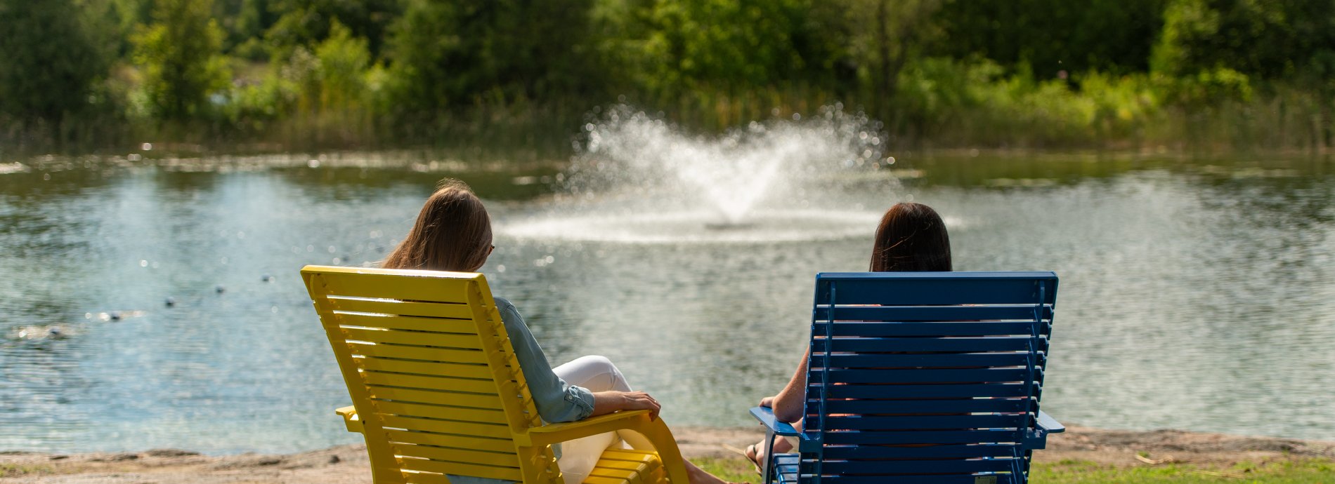 two people sitting in beach chairs at Washago Centennial Park